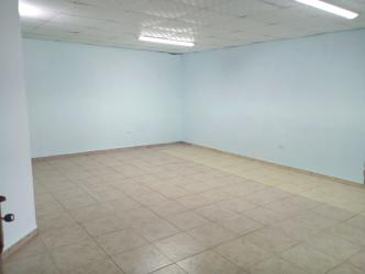 Empty bedroom with tile floor, blue walls, window Lluvia de Oro 2 Arraiján Panama