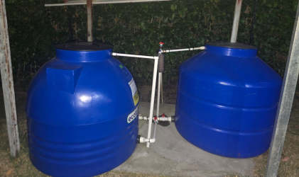Two blue water reserve tanks for mountain cabin rental in Boquete Panama Volcancito