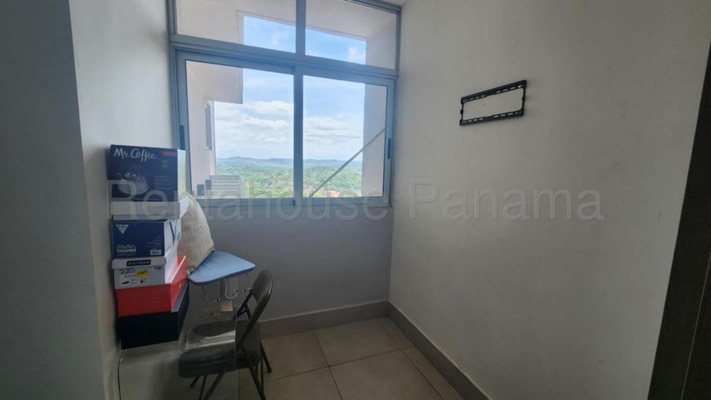 Infinity pool and social terrace area overlooking city skyline at PH Dos Mares Panama