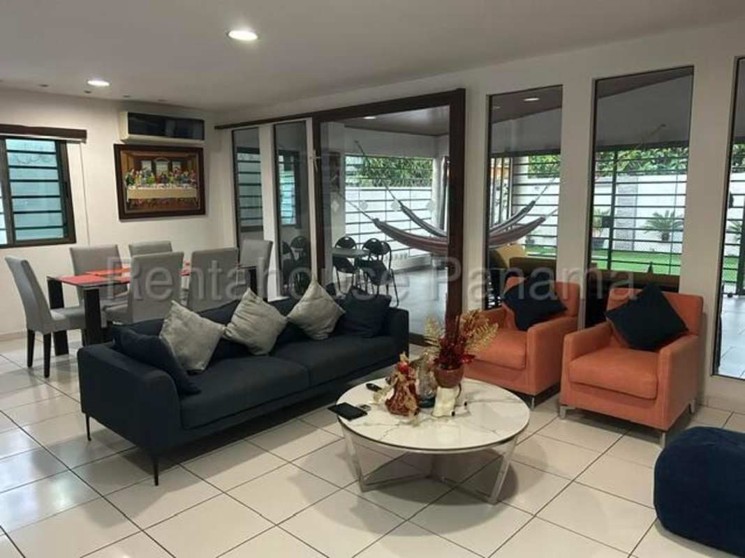 Spacious bedroom with large windows and built-in closets in house for sale Chanis Panama