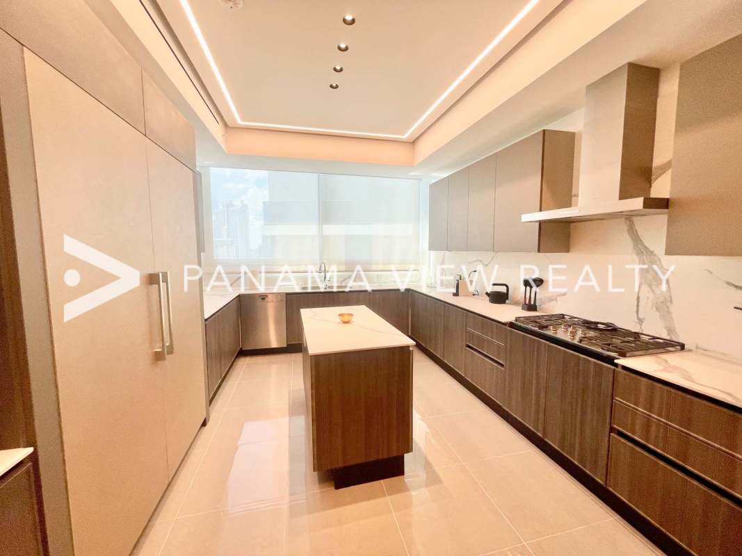 Contemporary marble island kitchen overlooking ocean PH Sea Point Panama