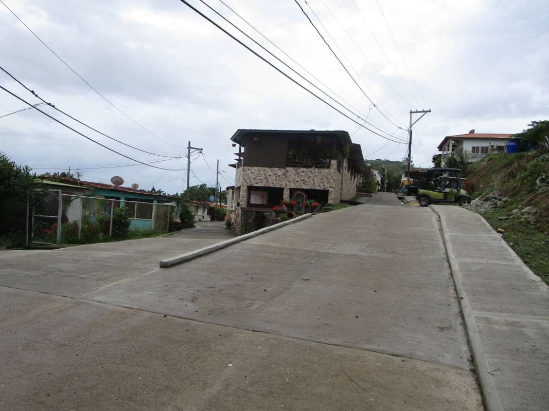 Distant Panama City skyline over ocean waters viewed from island property