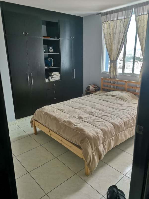 Home office with desk, ergonomic chair, window with curtains at PH Parque Central Carrasquilla Panama