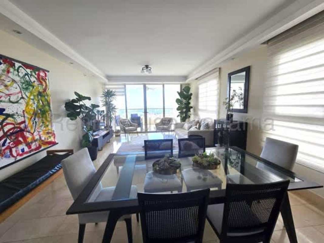 Gourmet kitchen with island counter, marble finish and premium appliances in Santa Maria Panama