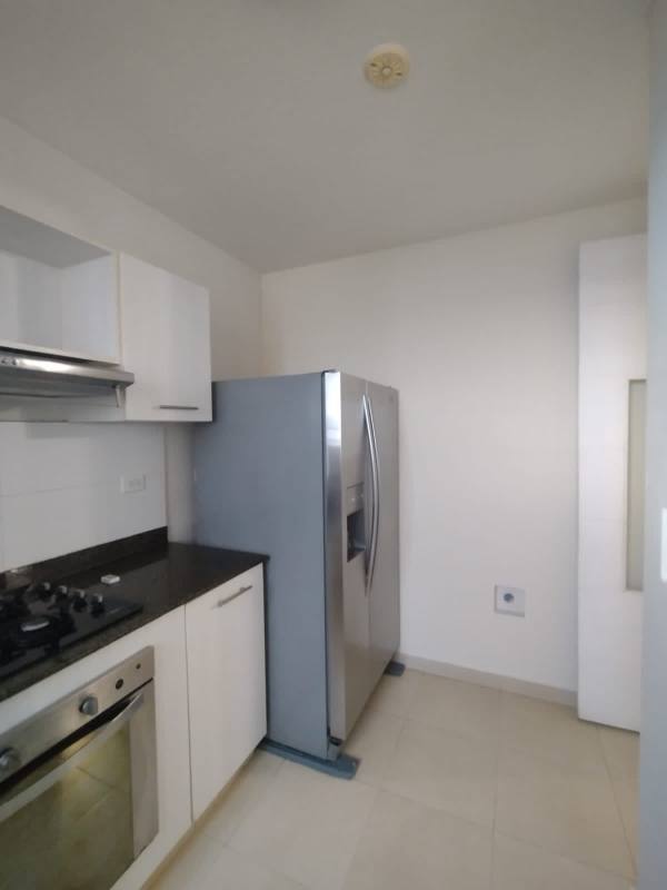 Bright bedroom with AC, window, tile floor in Torres de Versalles Panama City