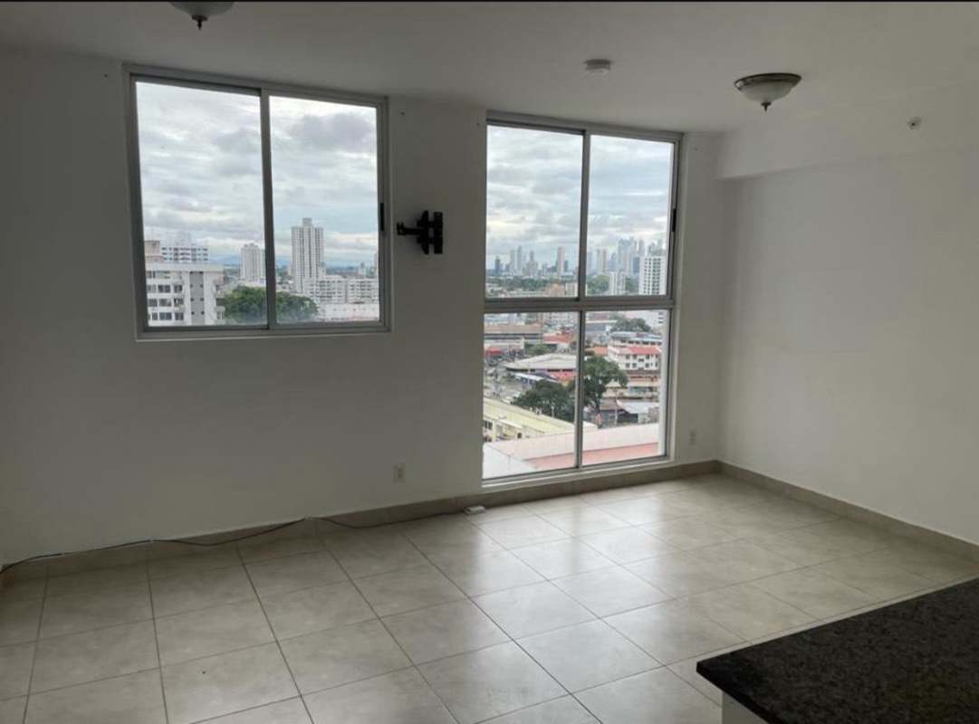 Unfurnished bright living room with city skyline view PH Gaudí