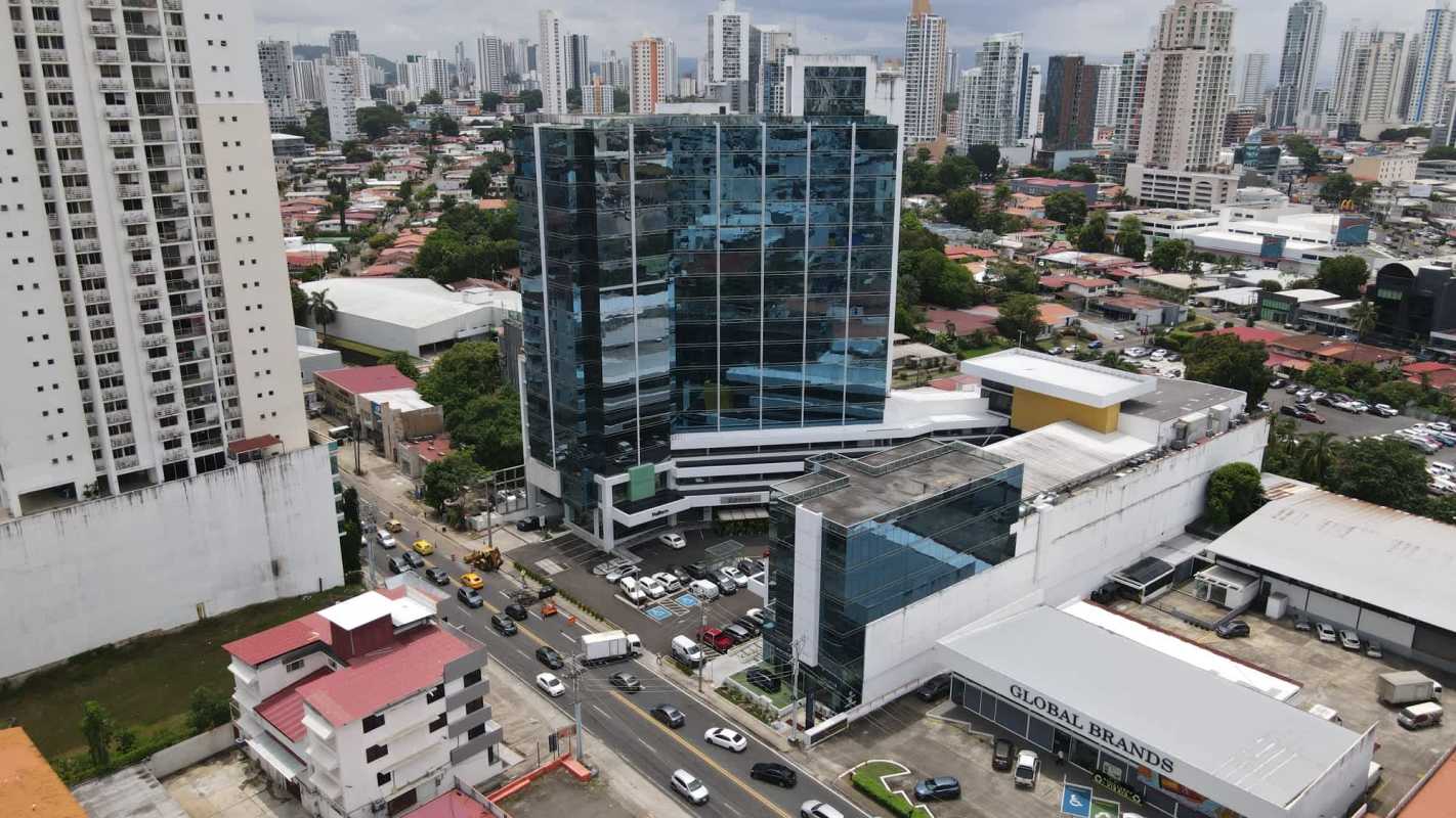 Aerial photo of City Mall complex modern glass facade multi-story commercial buildings Via Brasil Panama City
