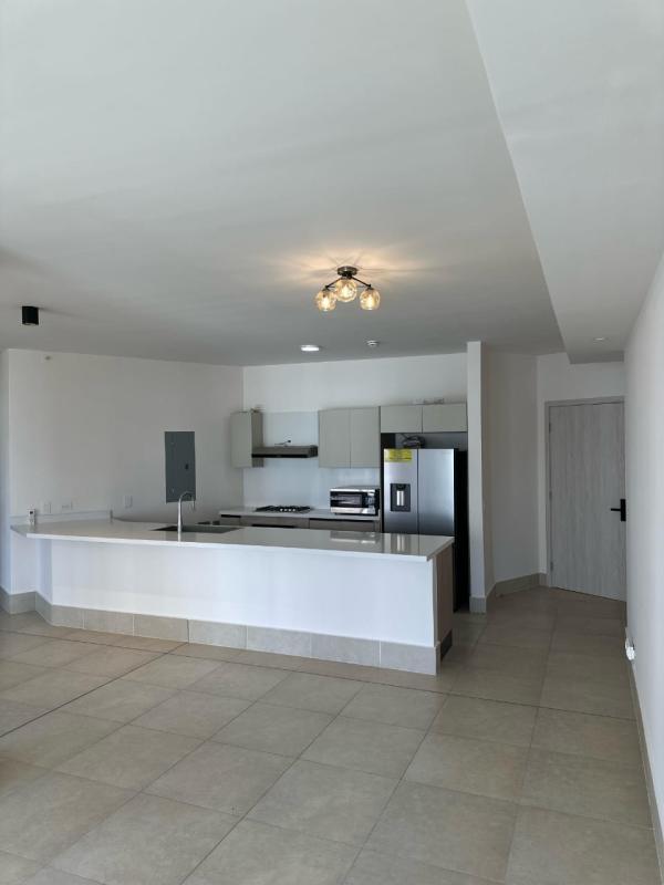 Laundry room with washer and dryer space, utility sink at Ocean House Panama