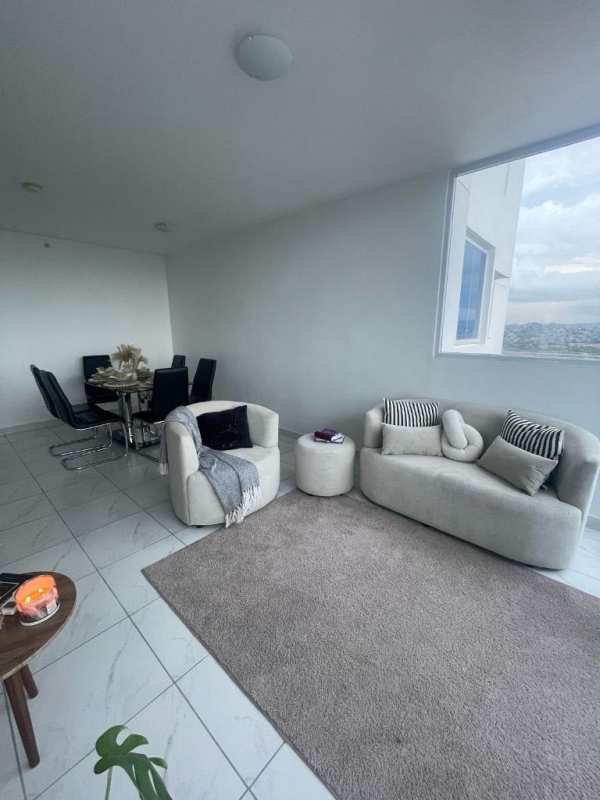 Modern kitchen with granite counters, gas stove and laundry in PH Millenials Torre Panama City