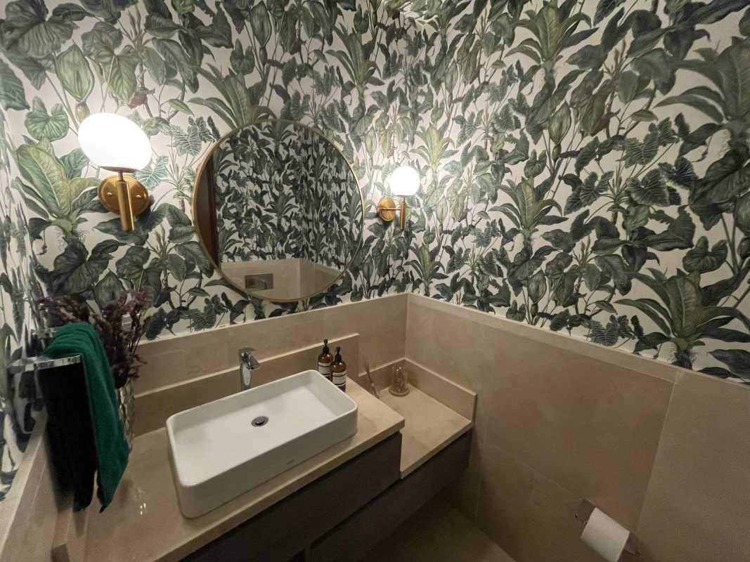 Master bedroom with large windows and golf course scenery in PH Santa Maria Panama