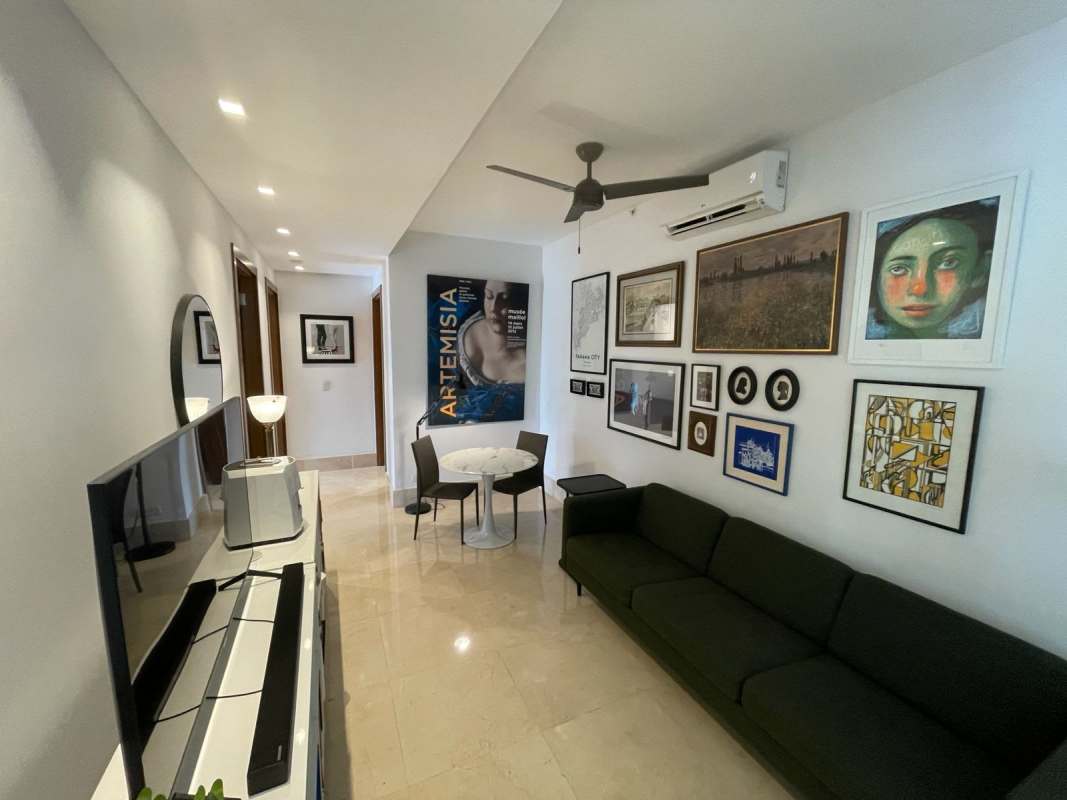 Spacious open living dining area in PH Santa Maria with modern decor and golf views Panama City
