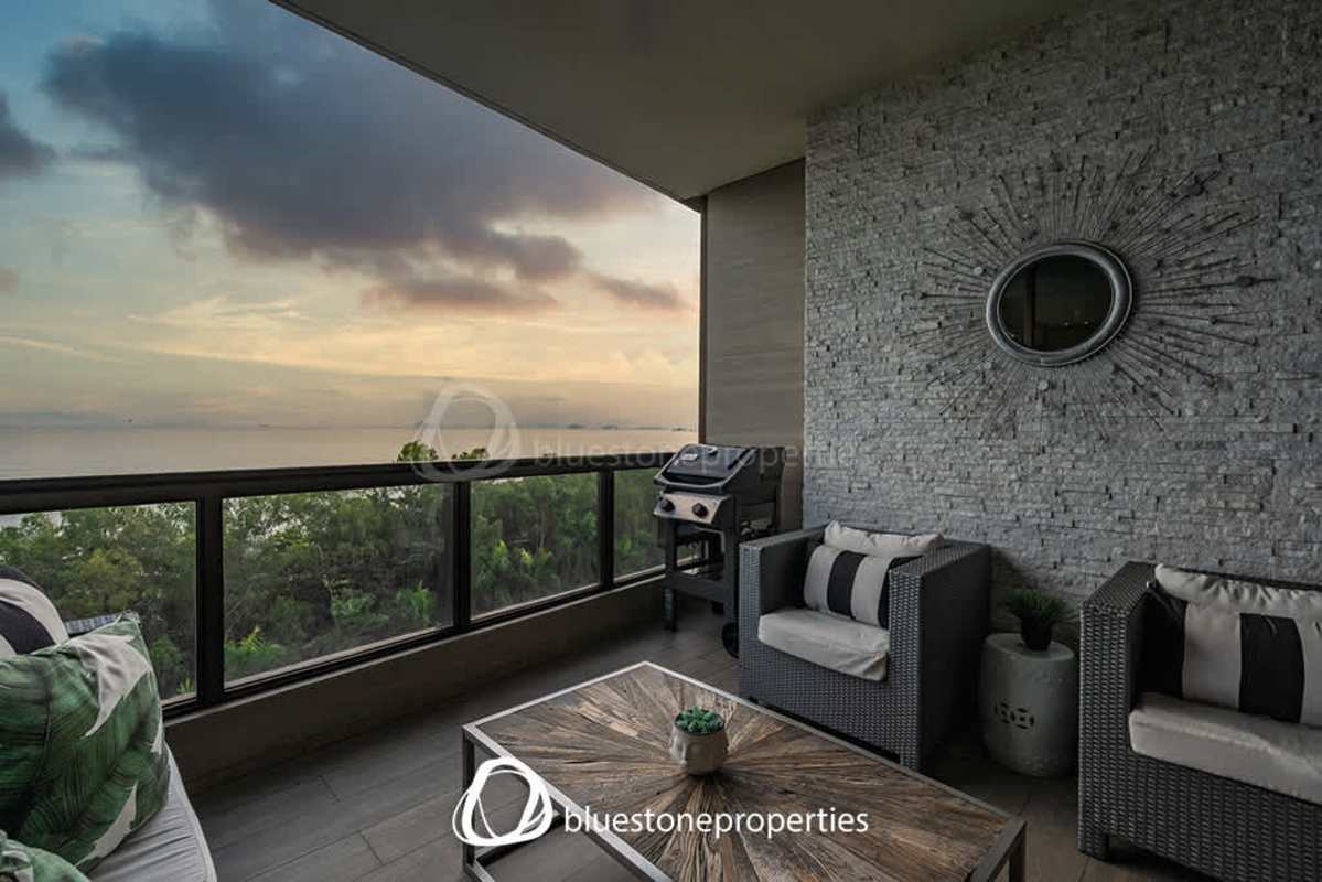 Dining room with large windows showcasing ocean views in luxury PH Mirador Panama City