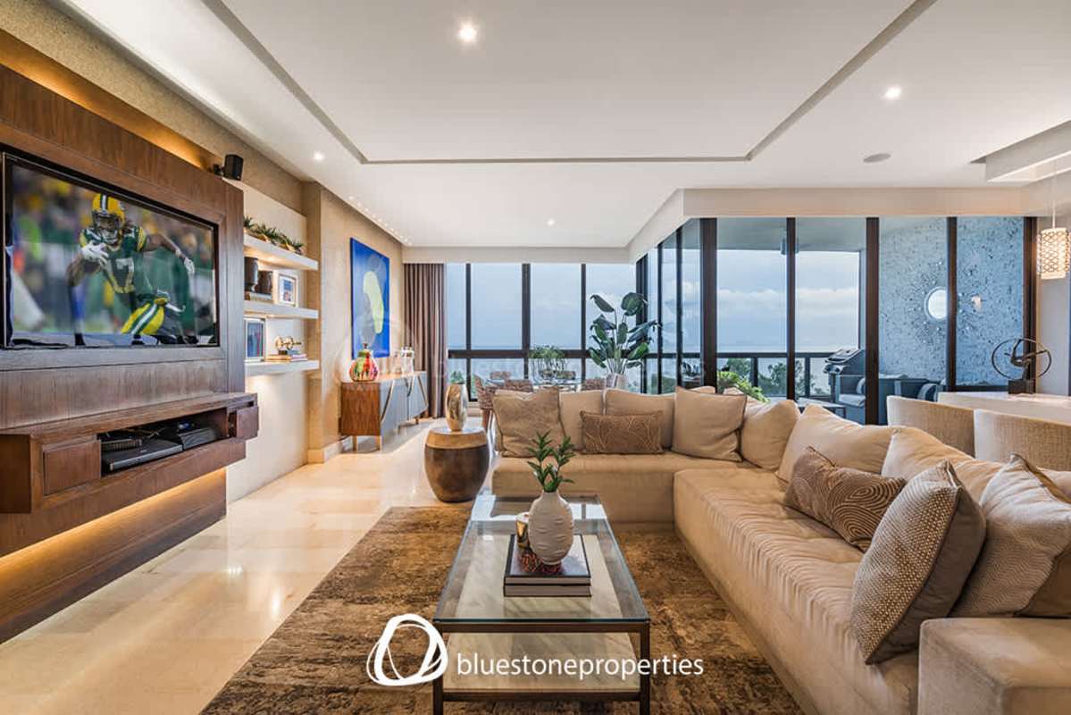 Elegant living room featuring floor-to-ceiling windows with panoramic Pacific Ocean vistas PH Mirador Panama