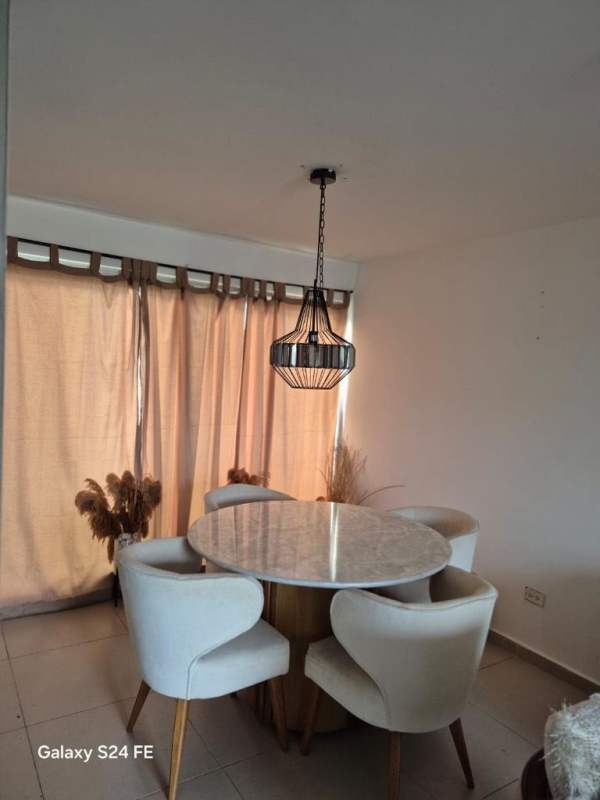 Dining area with modern furnishings in PH Villa Sol townhouse for rent in El Crisol Panama