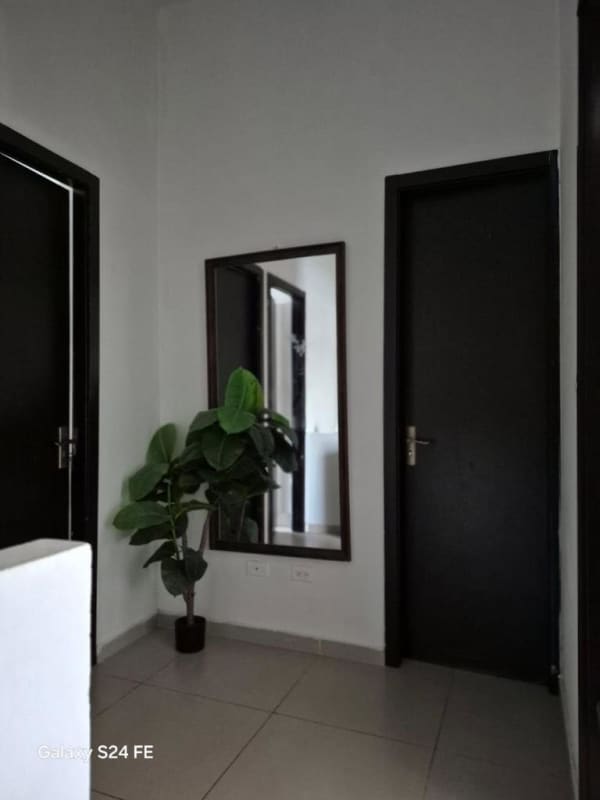 Hallway area with large mirror and modern decor PH Villa Sol townhouse in El Crisol Panama