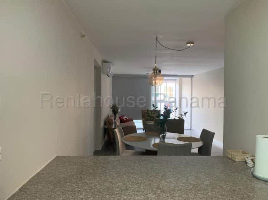 Dining room open kitchen granite counter porcelain floor PH Altos de Golf Panama City