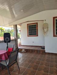 Spacious patio with barbecue setup and tiled floor corner property in Los Sauces Panama