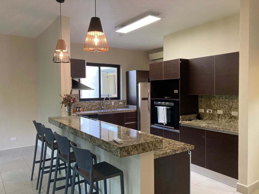 Spacious living and dining room with balcony Embassy Club Clayton Panama City