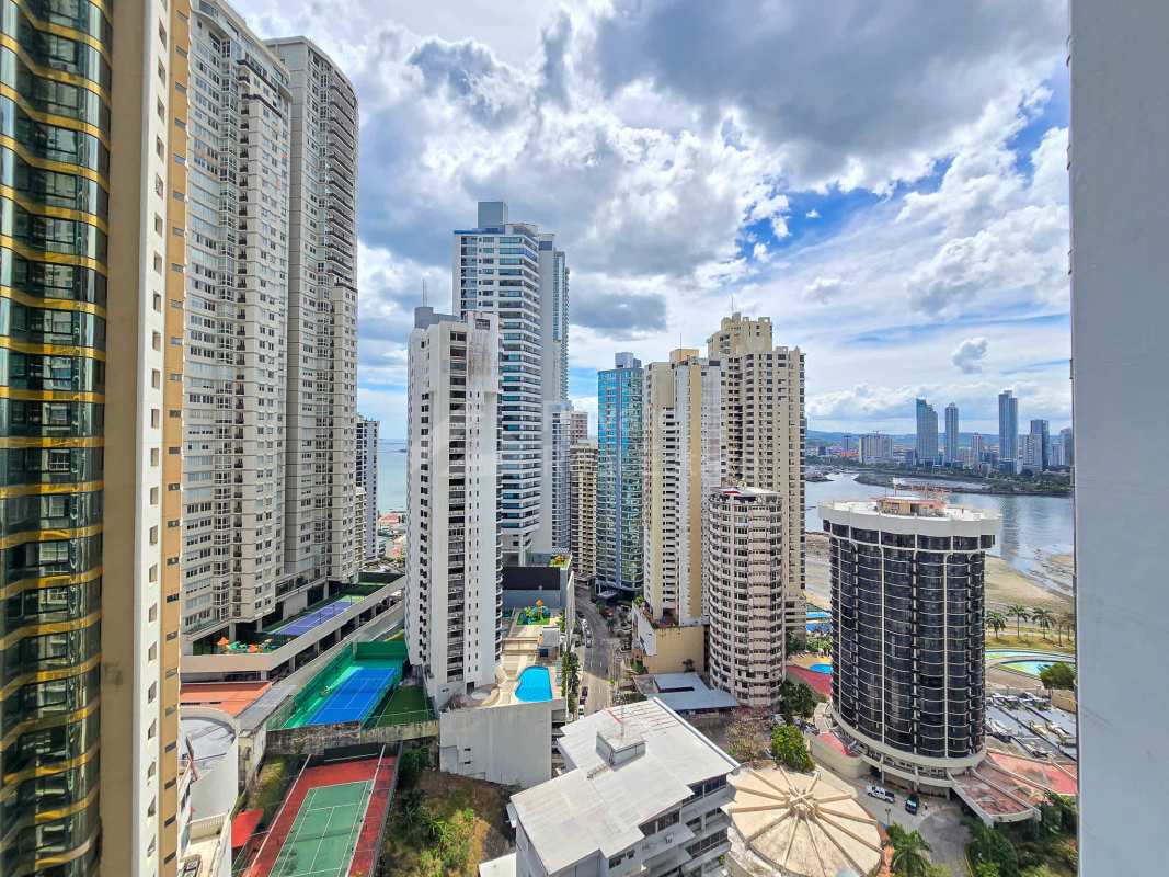 Modern bathroom with glass shower, marble vanity in PH Aventura Tower Punta Paitilla
