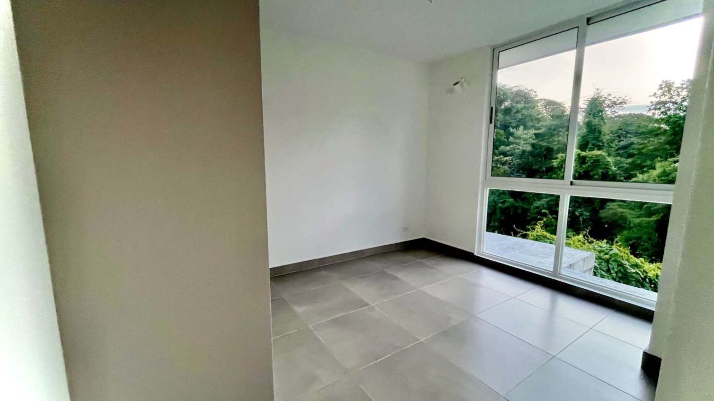 Kitchen with modern cabinetry stove oven in PH Forest Gate Clayton Panama