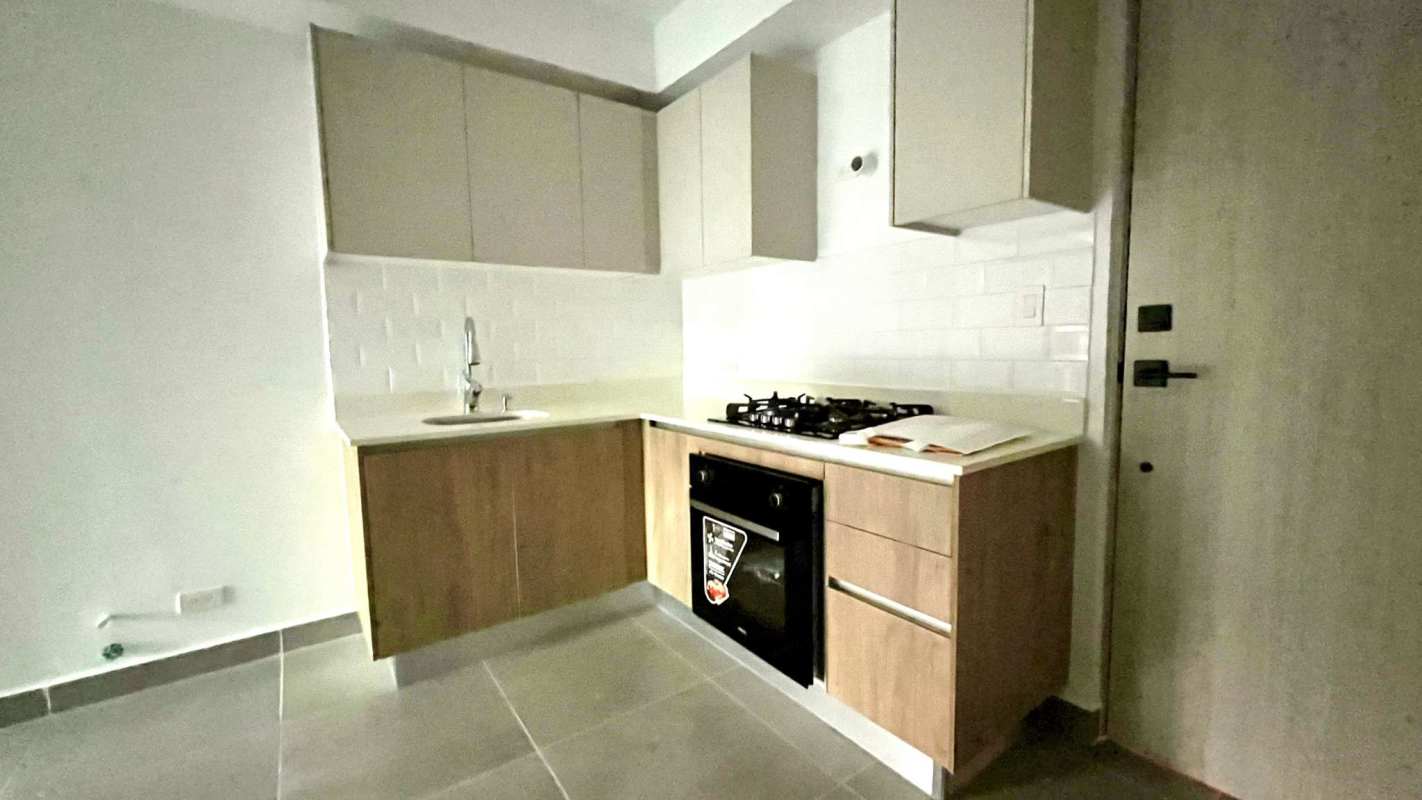 Modern gym with cardio equipment and garden views at PH Forest Gate Clayton Panama