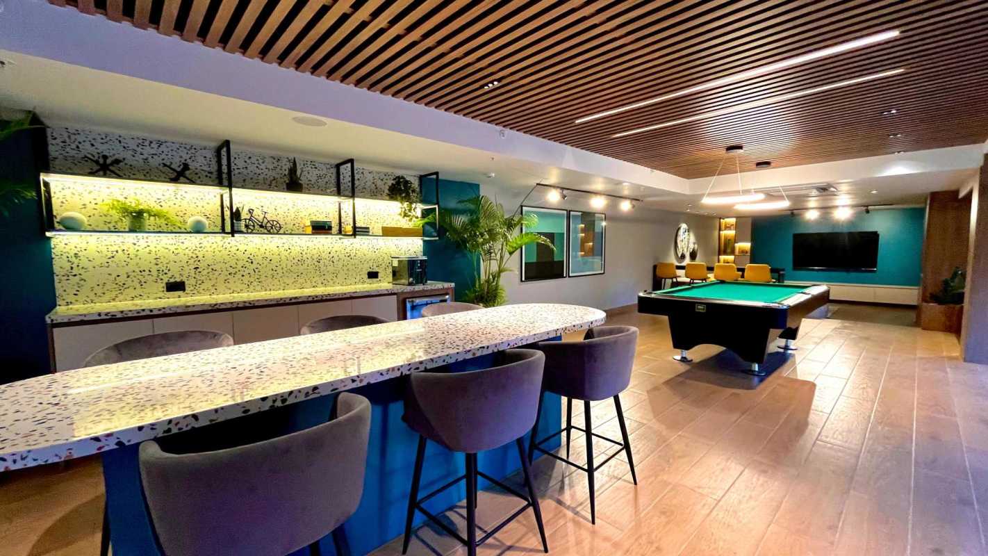 Spacious recreation lounge with pool table and bar in PH Forest Gate Clayton Panama