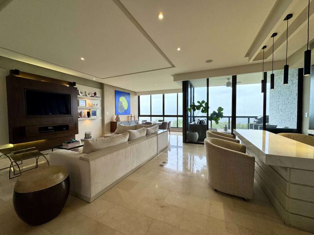 Spacious living area with marble floors and panoramic ocean views at PH Panama Bay Costa del Este Panama