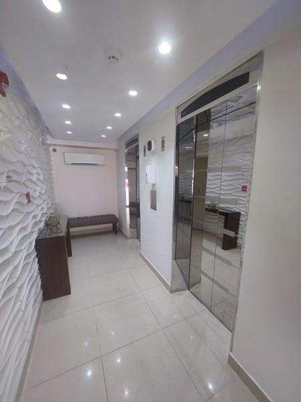 Polished lobby entrance with elevators at PH Green Park Condado del Rey Panama