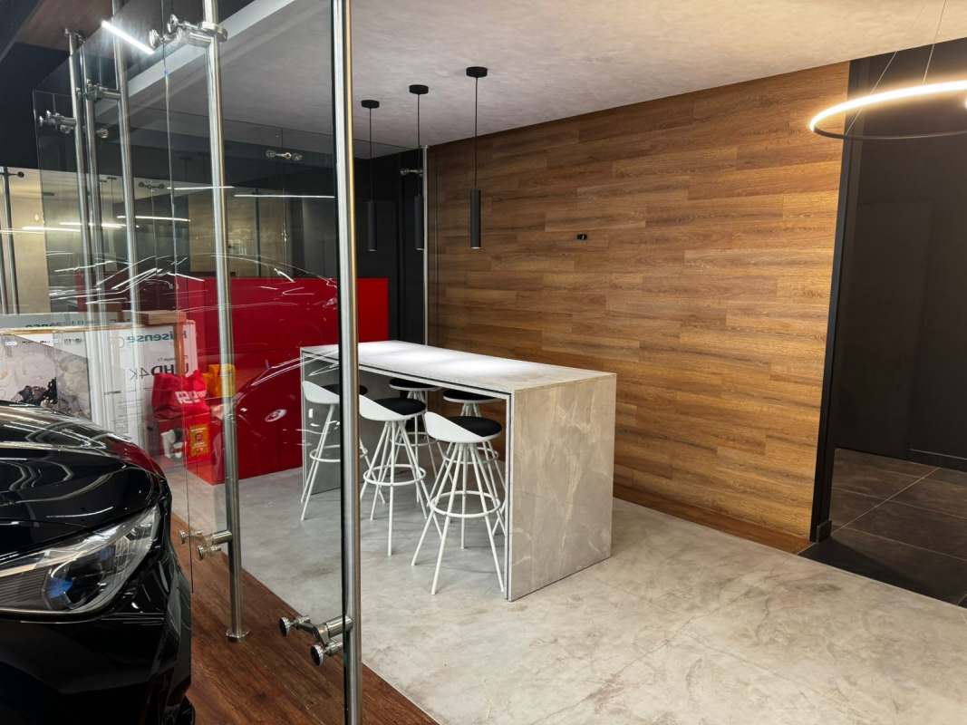 Modern black corridor with tile floor inside commercial building Obarrio Calle 50 Panama