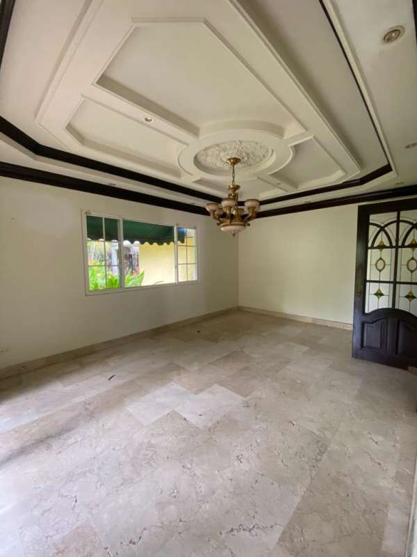 Large walk-in wooden closet with built-in shelves PH Costa Dorada Panama