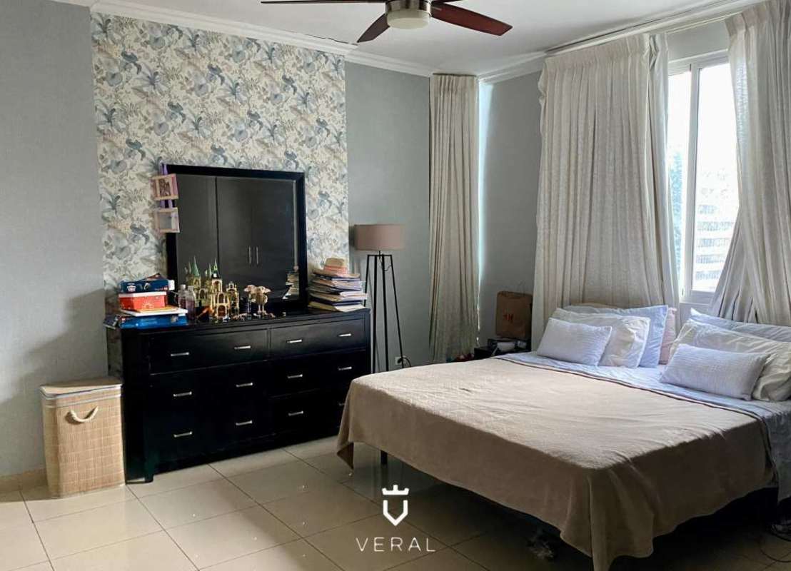 Master bedroom with natural light, closet, and marble floors PH Galeria Uno Panama City