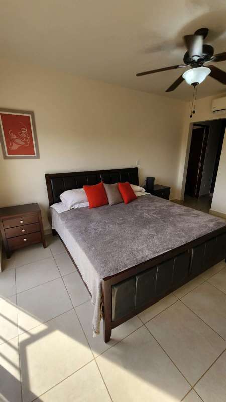 Modern bathroom with double sink vanity and glass shower in PH Embassy Club Panama