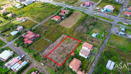 Gently sloping residential and commercial land parcel with mountain panorama