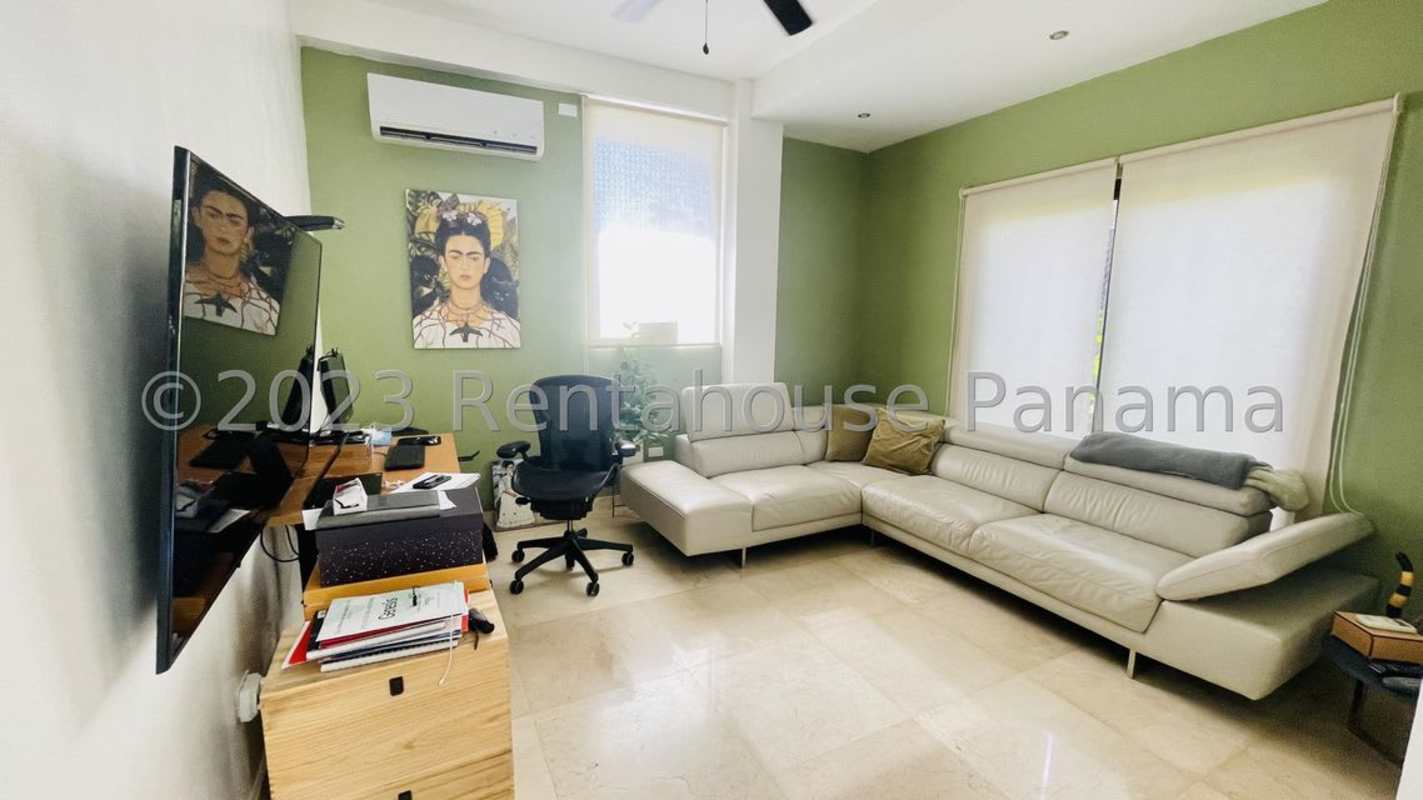 Master bedroom with split AC, sofa, king bed, large windows and bright lighting Clayton Village Panama