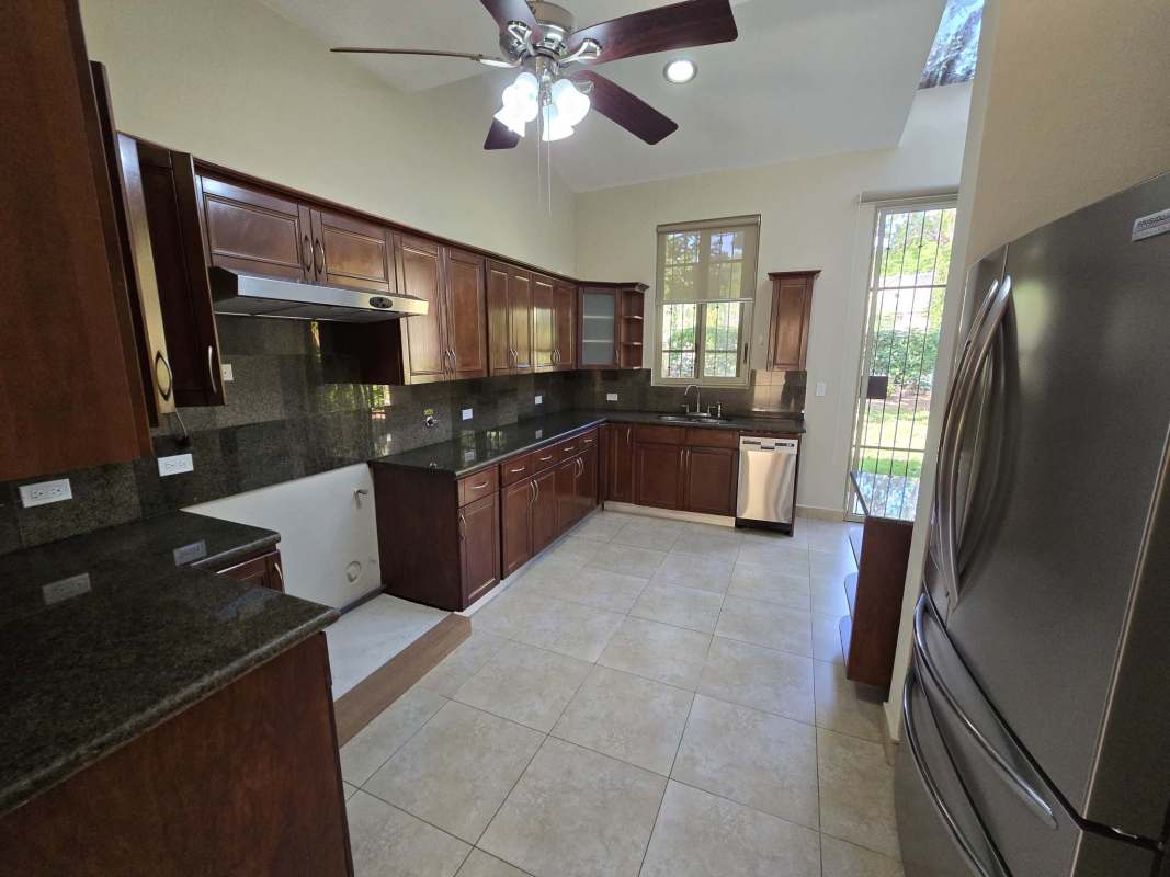 Living room high ceilings large windows tile floors PH Embassy Gardens Clayton