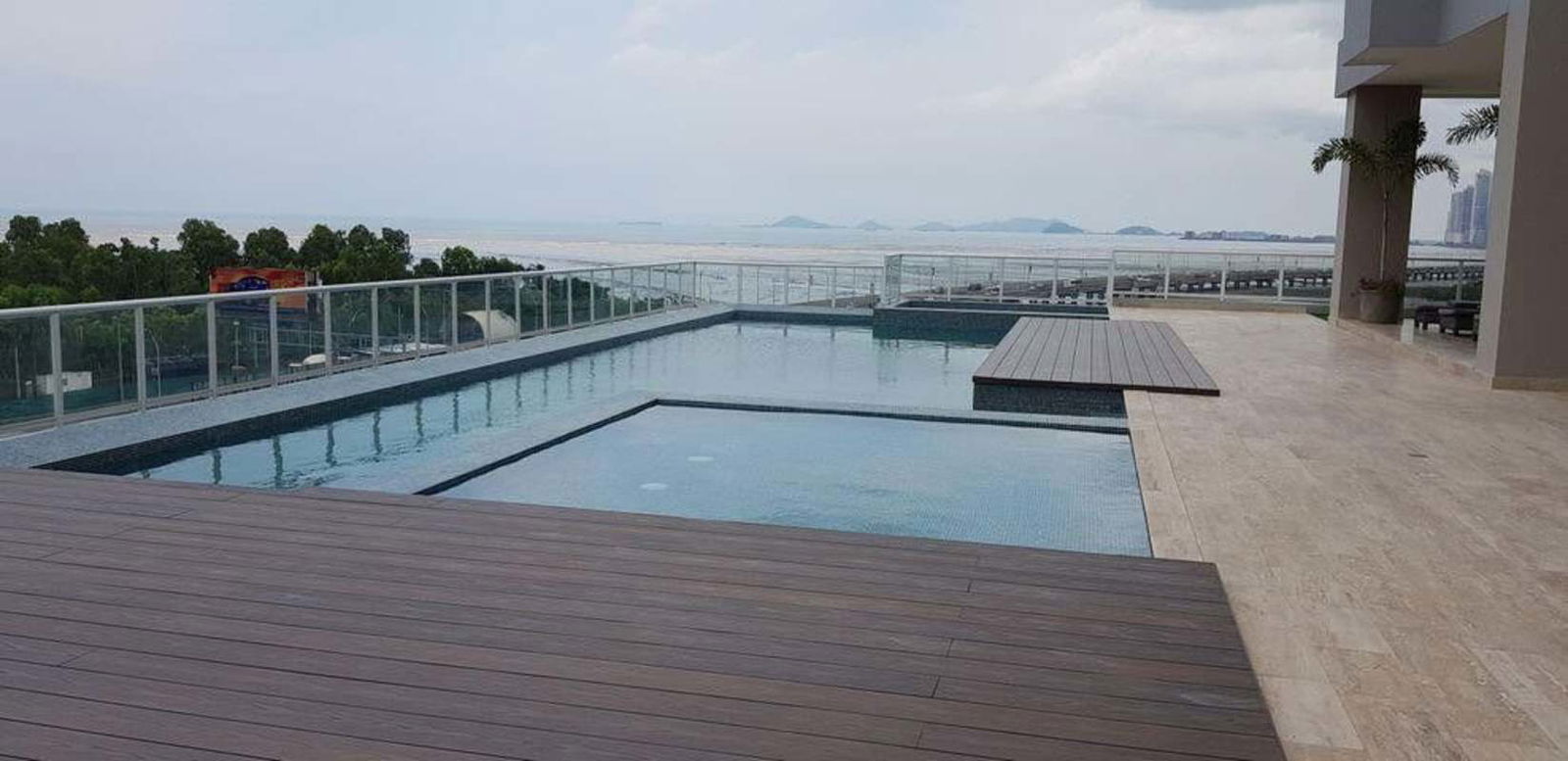 Master bedroom floor-to-ceiling windows city ocean view PH Asia Costa del Este Panama