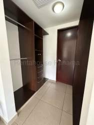 Open kitchen with granite counters, appliances and cabinetry in PH Mosaic apartment Panama Pacifico