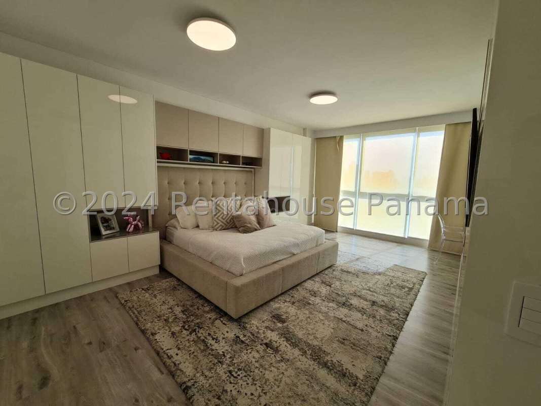 Modern bedroom with large ocean view windows PH Oceanaire luxury apartment Panama