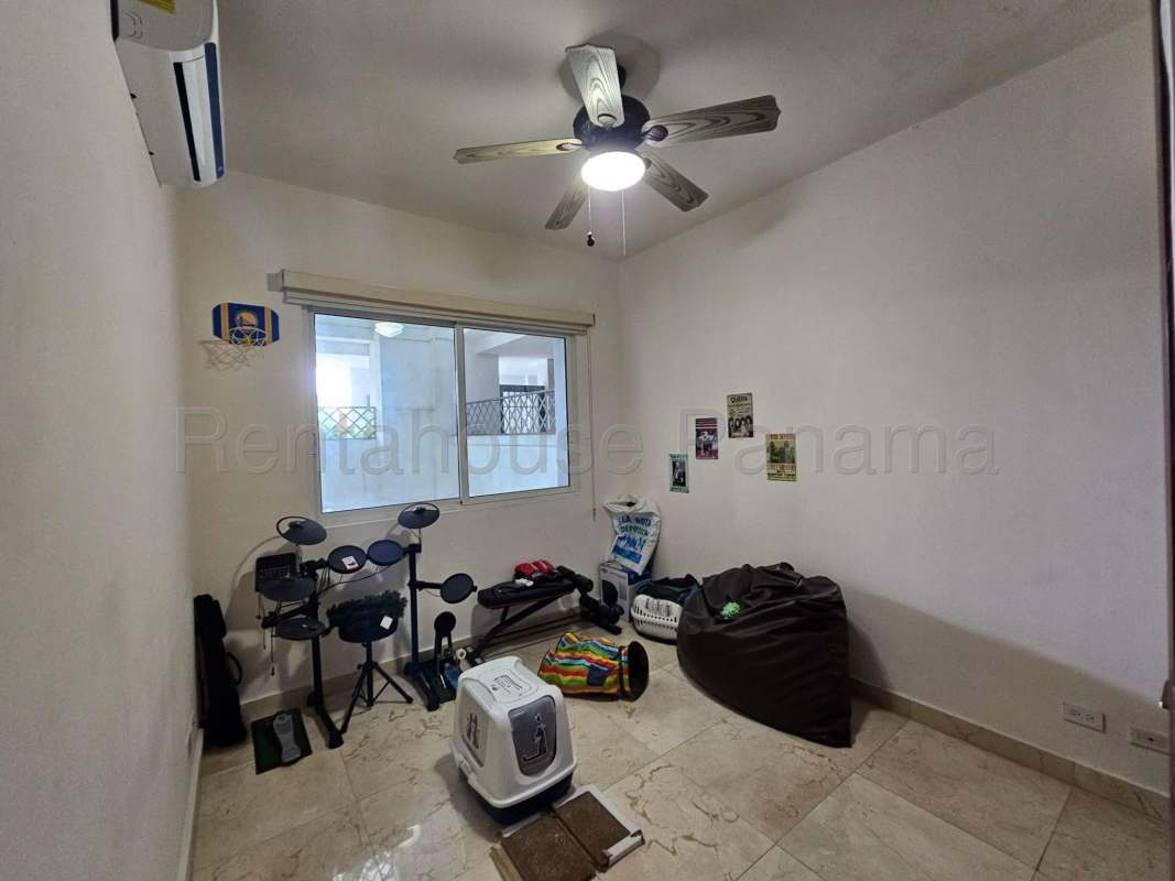 Large master bedroom with marble floors, balcony golf view, and ensuite in PH The Reserve Santa Maria Panama