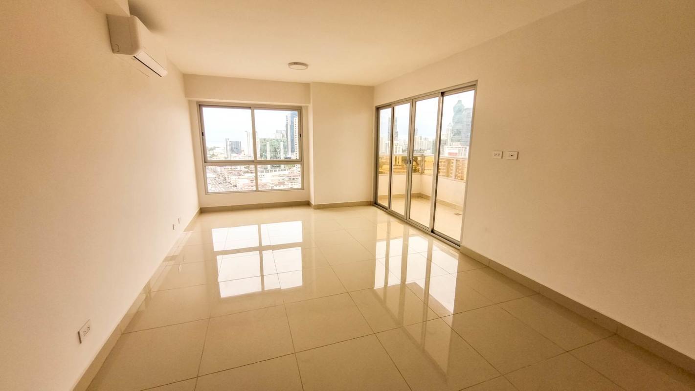 Spacious living area with glossy tile floors, balcony access, air conditioning PH Vista Hermosa Panama City