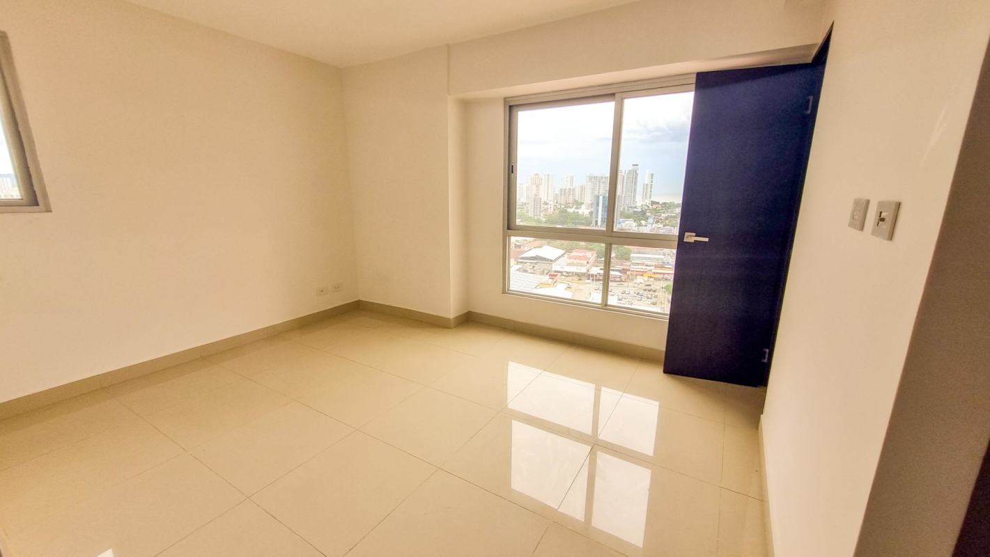 Bedroom space with large window overlooking city ceramic tile PH Vista Hermosa Panama