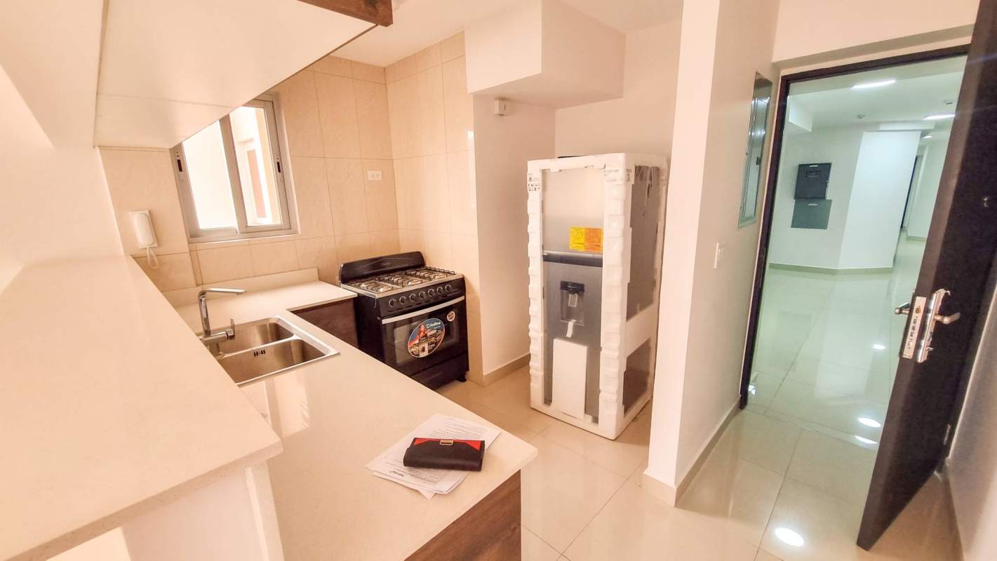 Contemporary kitchen with granite counters window stove fridge PH Vista Hermosa El Carmen Panama