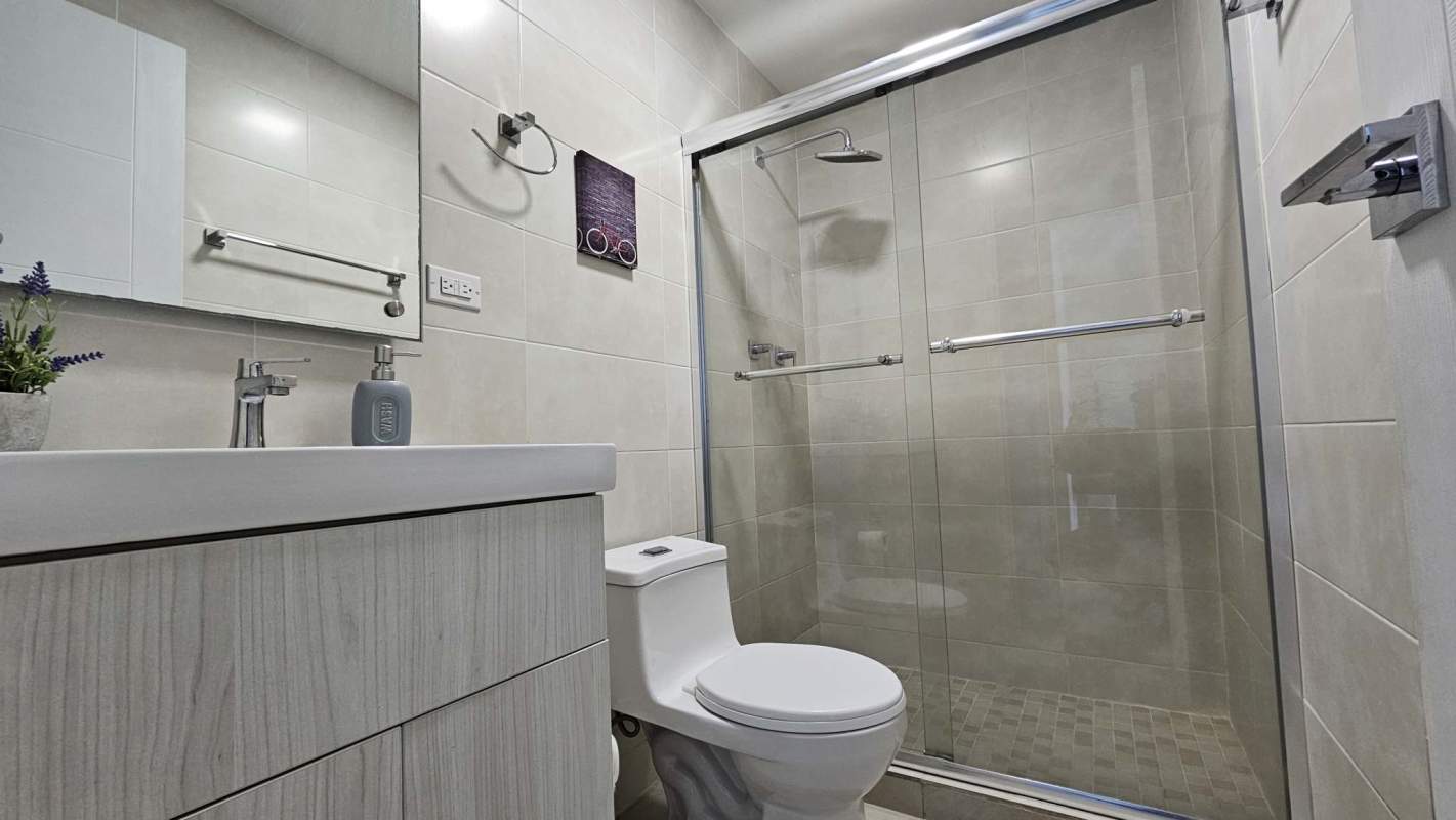 Contemporary kitchen with granite countertops and cabinets Villa Sur Costa Sur Panama