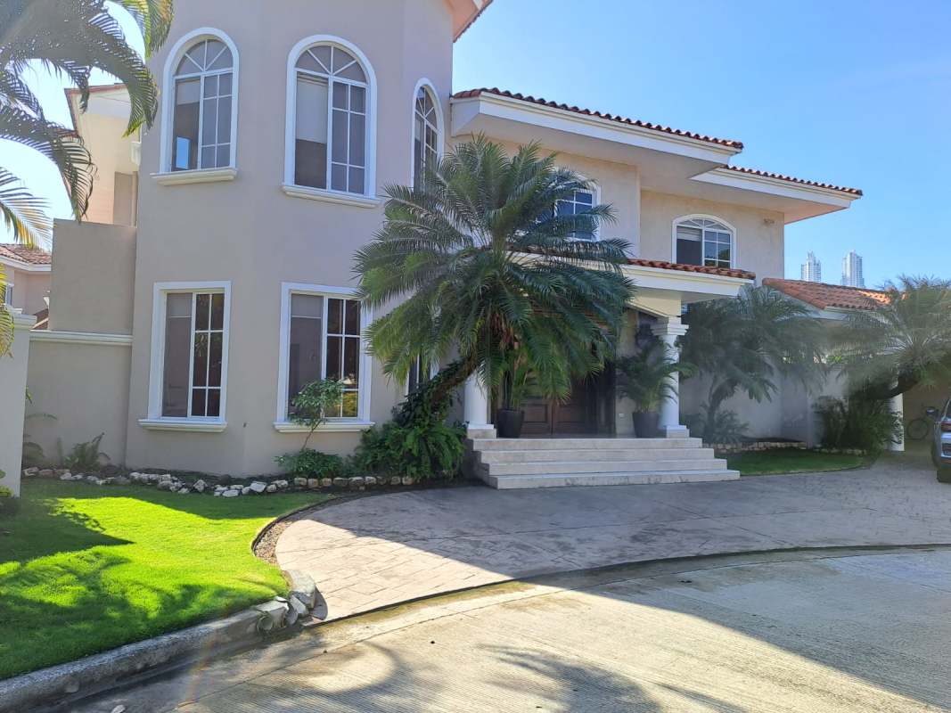 Luxury family home facade with arches and gardens Costa del Este Panama