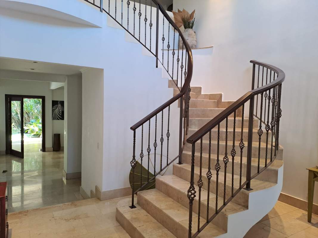 Elegant dining area with natural light garden views in Costa del Este luxury estate Panama