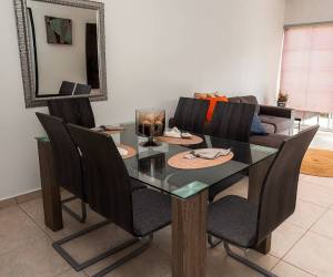 Paved street lined with single-story homes in Villas de Roma community Arraiján Panama