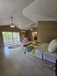 Living room with vaulted ceiling natural light entry terrace views luxury home Urbanización Gaital
