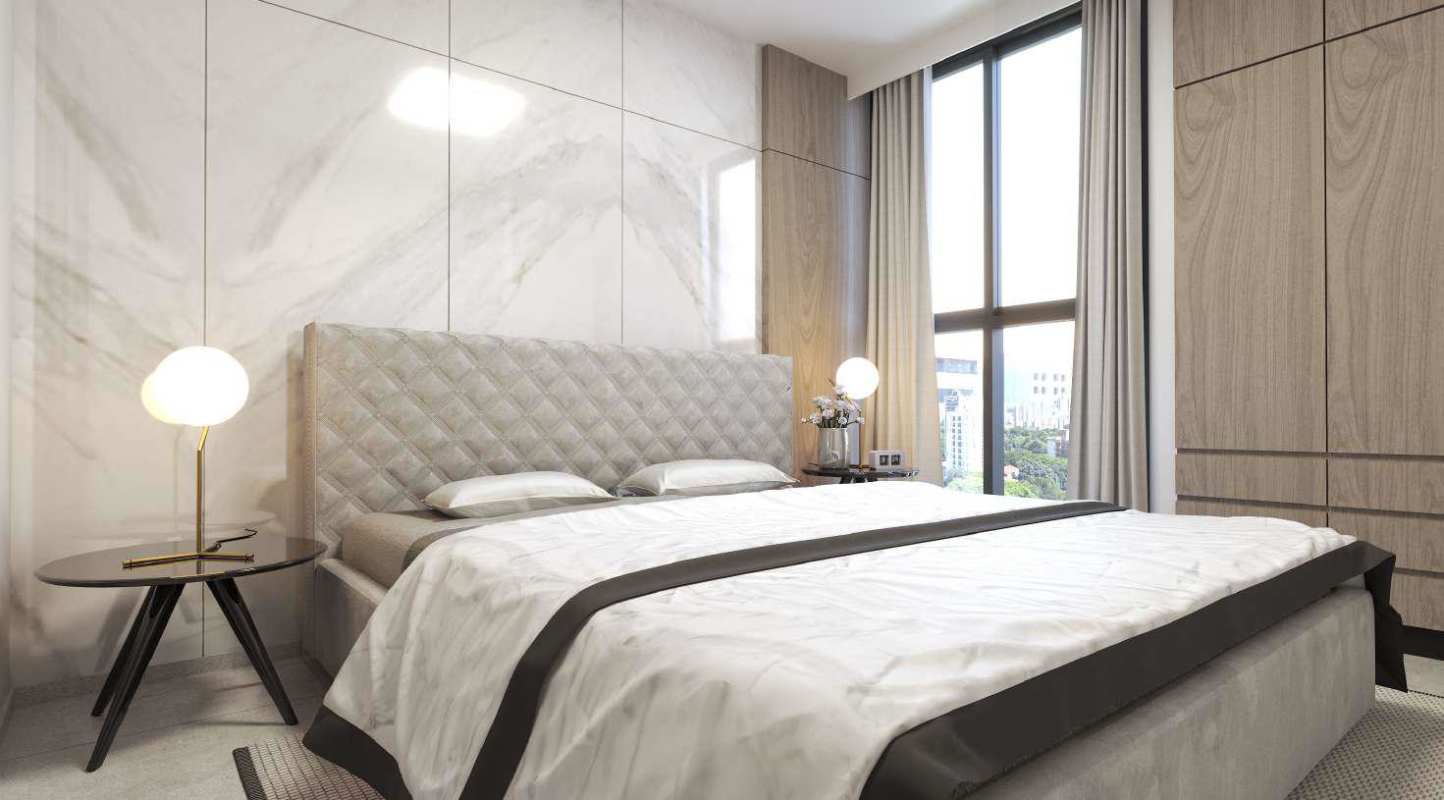 Minimalist bedroom design with concrete wall, upholstered bed and large window at X The Building San Francisco Panama