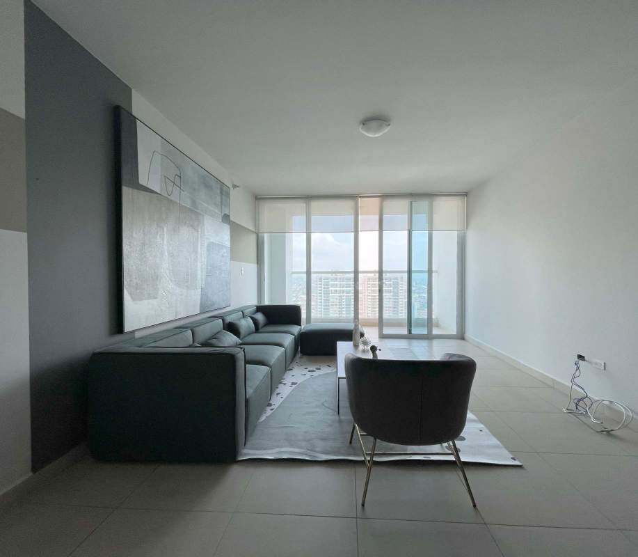 Luxury penthouse bedroom with wooden accent wall and elegant decor in PH Country Club Costa del Este Panama City