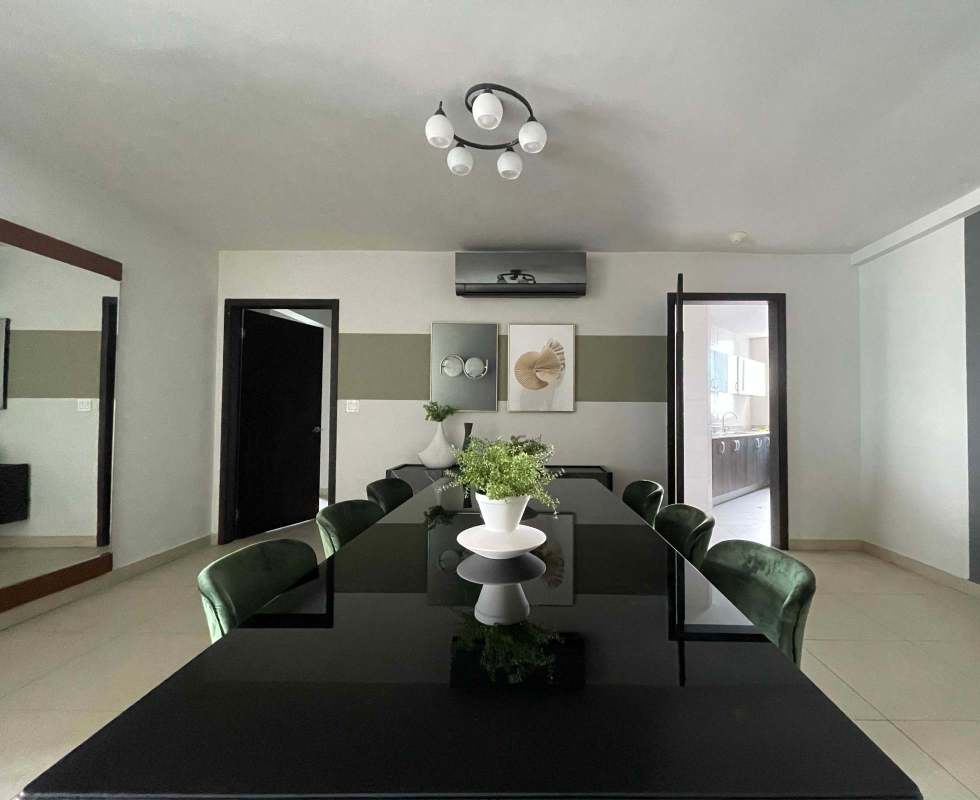 Elegant dining room with designer furniture and modern decor in penthouse PH Country Club Costa del Este Panama